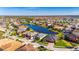 Aerial view of home on a lake in a residential community at 13307 Fawn Lily Dr, Riverview, FL 33579