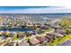 Aerial view of home on a lake in a residential community at 13307 Fawn Lily Dr, Riverview, FL 33579
