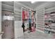 Large walk-in closet with ample shelving and hanging space at 13307 Fawn Lily Dr, Riverview, FL 33579