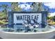 Waterleaf community sign with a water feature at 13307 Fawn Lily Dr, Riverview, FL 33579