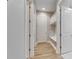 Bright hallway with built-in bench seating and storage at 13307 Fawn Lily Dr, Riverview, FL 33579