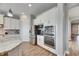 Modern kitchen features stainless steel appliances and ample cabinetry at 13307 Fawn Lily Dr, Riverview, FL 33579