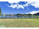 Scenic lake view from backyard, offering tranquil outdoor space at 13307 Fawn Lily Dr, Riverview, FL 33579