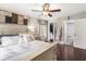 Spacious bedroom with a king-size bed and an ensuite bathroom at 1398 Shady Pine Way # G3, Tarpon Springs, FL 34688