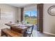 Farmhouse dining room with sliding glass doors to backyard at 1715 Tahitian Sunrise Dr, Plant City, FL 33565