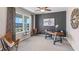 Home office with a desk, chair, and large window at 1715 Tahitian Sunrise Dr, Plant City, FL 33565