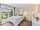 Cozy bedroom with a full-size bed and backyard view at 1716 Tahitian Sunrise Dr, Plant City, FL 33565