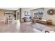 Combined living and dining area with neutral color scheme and natural light at 1716 Tahitian Sunrise Dr, Plant City, FL 33565