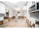 Damage to kitchen with exposed walls and flooring, new cabinets installed at 175 83Rd N Ave, St Petersburg, FL 33702