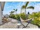 Landscaped backyard oasis with patio and hammock at 2584 89Th Street E Cir, Palmetto, FL 34221