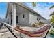 Relaxing backyard with patio, hammock and seating at 2584 89Th Street E Cir, Palmetto, FL 34221