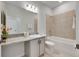 Well-appointed bathroom with a bathtub, granite countertop, and tile flooring at 2584 89Th Street E Cir, Palmetto, FL 34221