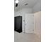 Spacious bedroom with gray carpet and a large window, offering ample natural light at 2584 89Th Street E Cir, Palmetto, FL 34221