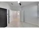 Bright bedroom with two doors and gray carpet flooring at 2584 89Th Street E Cir, Palmetto, FL 34221