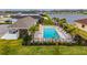 Community pool with plenty of lounge chairs for relaxing at 2584 89Th Street E Cir, Palmetto, FL 34221