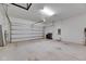 Large garage with white walls and an automatic garage door at 2584 89Th Street E Cir, Palmetto, FL 34221
