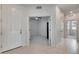 Bright hallway with doors to bedrooms and other rooms at 2584 89Th Street E Cir, Palmetto, FL 34221