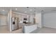Modern kitchen with an island, stainless steel appliances, and granite countertops at 2584 89Th Street E Cir, Palmetto, FL 34221