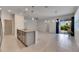 Open kitchen with island, granite countertops, stainless steel appliances at 2584 89Th Street E Cir, Palmetto, FL 34221
