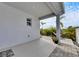 Relaxing patio with hammock and tropical landscaping at 2584 89Th Street E Cir, Palmetto, FL 34221
