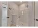 Modern shower with glass enclosure and built-in seat at 2584 89Th Street E Cir, Palmetto, FL 34221