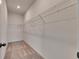 Large walk-in closet with wire shelving at 2584 89Th Street E Cir, Palmetto, FL 34221