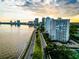 Stunning aerial view of waterfront property with cityscape backdrop at 2611 Bayshore Blvd # 302, Tampa, FL 33629