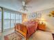 Guest bedroom with a queen-size bed and wood dresser at 2611 Bayshore Blvd # 302, Tampa, FL 33629