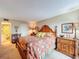 Main bedroom with king-size bed and en-suite bathroom access at 2611 Bayshore Blvd # 302, Tampa, FL 33629