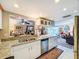 Well-equipped kitchen with granite countertops and stainless appliances at 2611 Bayshore Blvd # 302, Tampa, FL 33629
