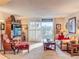 Bright living room with access to a balcony and hardwood floors at 2611 Bayshore Blvd # 302, Tampa, FL 33629