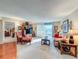 Living room with hardwood floors, comfortable seating, and bedroom view at 2611 Bayshore Blvd # 302, Tampa, FL 33629
