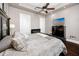 Bright bedroom with a king-size bed and fireplace at 275 Bayshore Blvd # 1702, Tampa, FL 33606