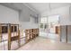 Kitchen area ready for renovation with white subway tile and slider to sunroom at 2812 Miriam S St, Gulfport, FL 33711