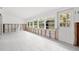 Sun room with many windows for ample light and slider to backyard at 2812 Miriam S St, Gulfport, FL 33711