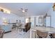 Spacious living room with vaulted ceiling and neutral decor at 29330 Schinnecock Hills Ln, San Antonio, FL 33576