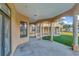 Covered patio offering backyard and landscape views at 309 Pruett Rd, Seffner, FL 33584