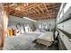 Unfinished garage interior during construction, showing materials and a concrete floor at 309 Pruett Rd, Seffner, FL 33584