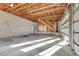 Spacious unfinished garage with high ceilings and large garage doors, currently under construction at 309 Pruett Rd, Seffner, FL 33584