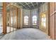 Interior of house under construction with large windows and exposed framing at 309 Pruett Rd, Seffner, FL 33584