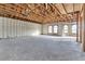 Large interior room with high ceilings and arched windows, currently under construction at 309 Pruett Rd, Seffner, FL 33584