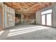 Large interior room with high ceilings and large windows, currently under construction at 309 Pruett Rd, Seffner, FL 33584