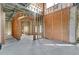 Unfinished interior with framing and large windows at 309 Pruett Rd, Seffner, FL 33584
