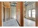 Interior of house under construction, featuring wood framing and concrete flooring at 309 Pruett Rd, Seffner, FL 33584