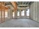 Living area framing with arched windows and high ceilings, under construction at 309 Pruett Rd, Seffner, FL 33584