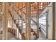 Unfinished stairwell framing during new home construction, showing the wooden structure at 309 Pruett Rd, Seffner, FL 33584