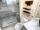 Modern bathroom with hexagon tile floor and glass shower at 3148 Harvardston Loop, Holiday, FL 34691
