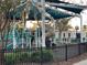 playground with modern equipment under shade at 3148 Harvardston Loop, Holiday, FL 34691