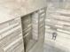 Modern shower with gray and white mosaic tile at 3148 Harvardston Loop, Holiday, FL 34691