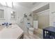 Clean bathroom with a shower/tub combo and vanity at 318 Windrush Blvd # 10, Indian Rocks Beach, FL 33785